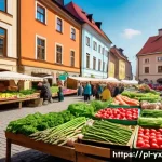 지속 가능한 식도락 여행 계획하기 - A vibrant local Polish farmer&rsquo;s market scene in springtime, featuring wooden stalls overflowing with...